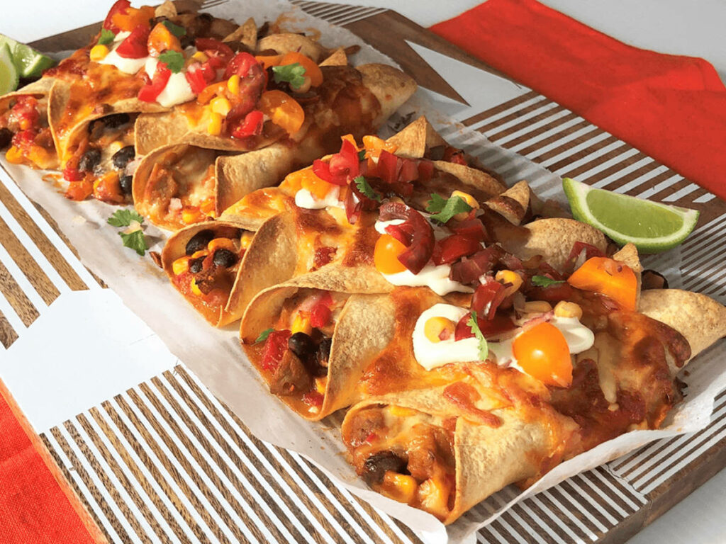 “Vibrant Wallpaper: Freshly Baked Enchiladas with Cheese & Salsa”