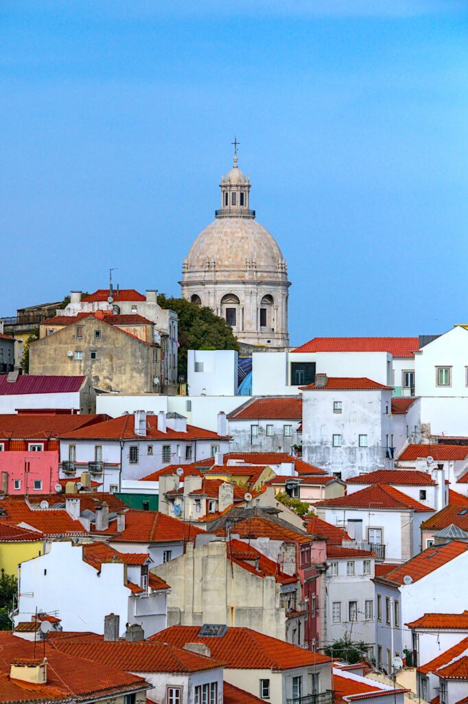 Vibrant European Cityscape Wallpaper with Colorful Houses & Towers