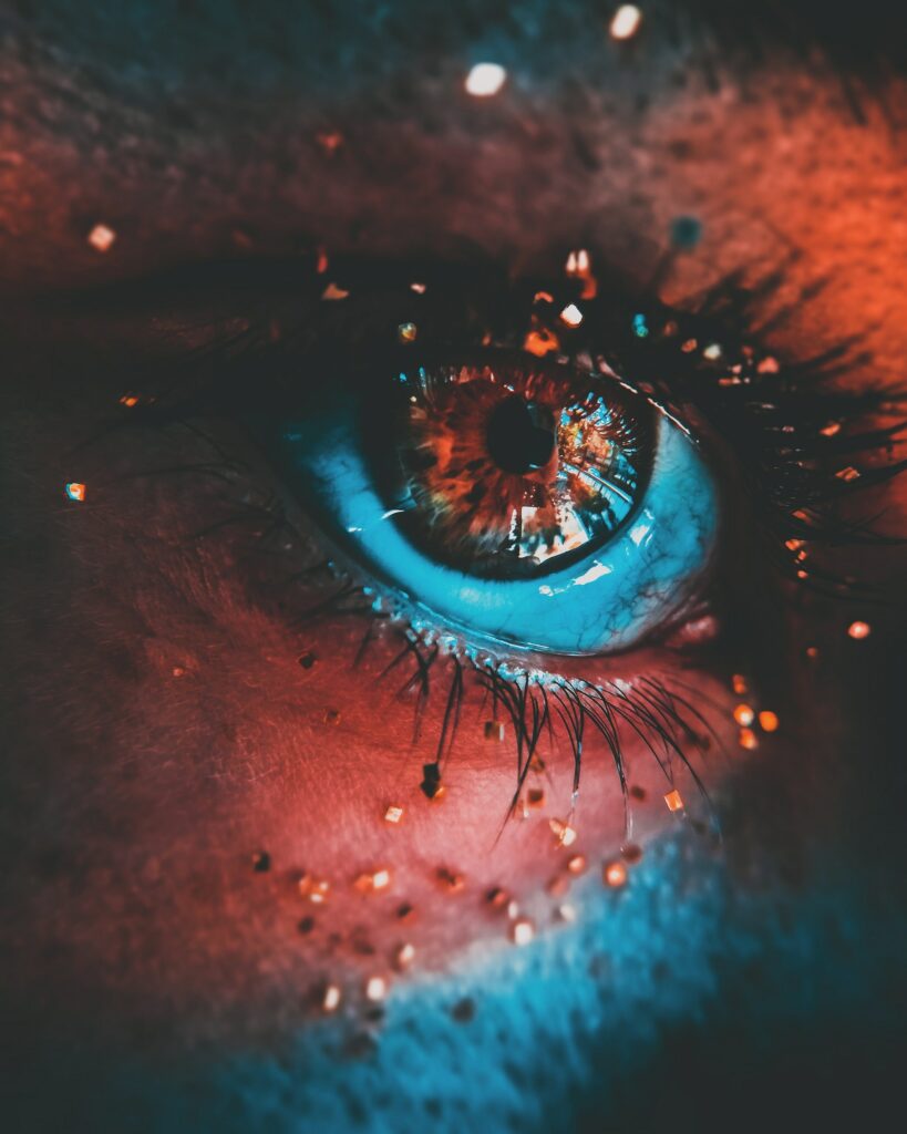Vibrant Eye Close-Up Wallpaper with Detailed Colorful Effects