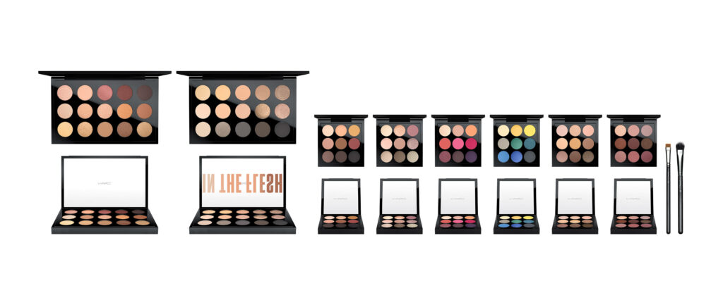 Eyeshadow palettes and makeup brushes with neutral warm vibrant shades on white background Wallpaper