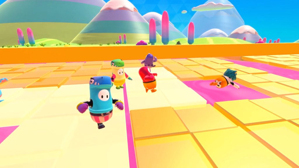 Fall Guys colorful beans in dino costumes on yellow platforms over pink slime with cartoon mountains Wallpaper