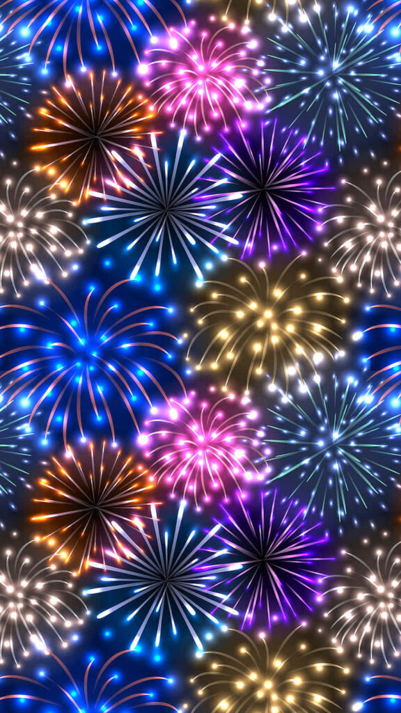 Colorful fireworks display wallpaper with blue pink yellow purple and orange bursts on black background