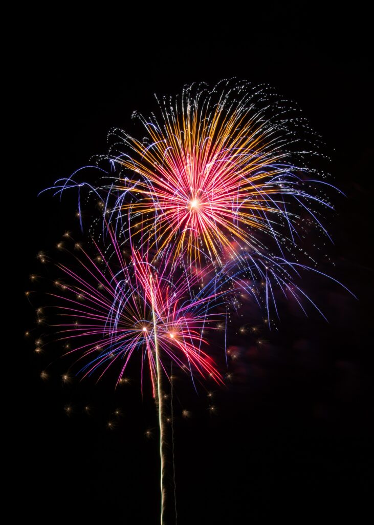 Vibrant Fireworks Wallpaper Background: Colorful Night Sky Display