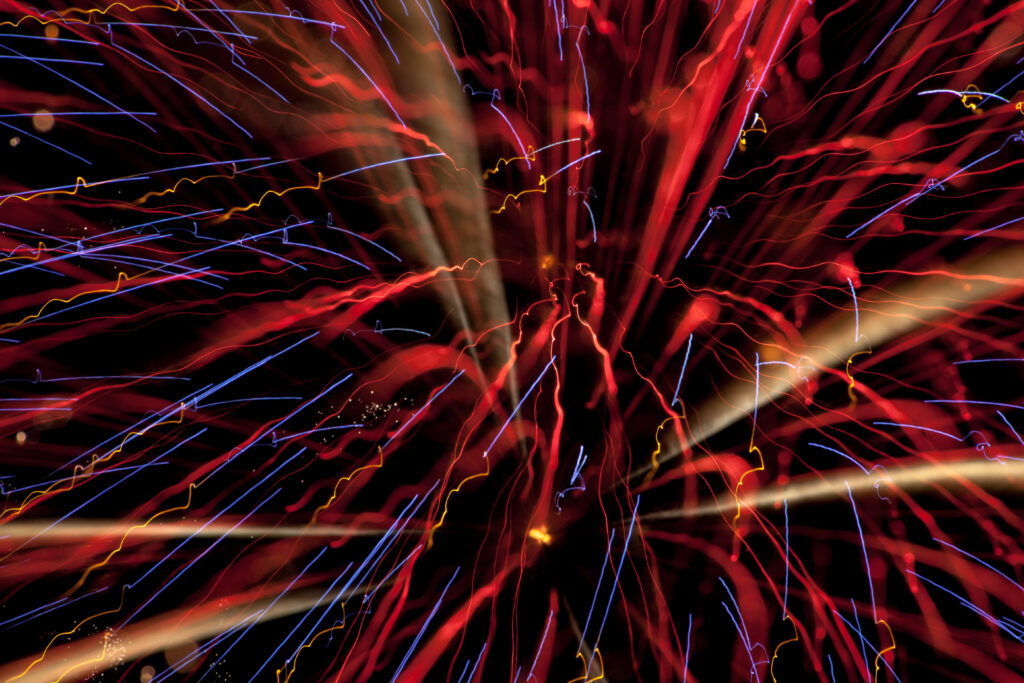 Vibrant Fireworks Wallpaper: Colorful Fiesta Background for Celebrations