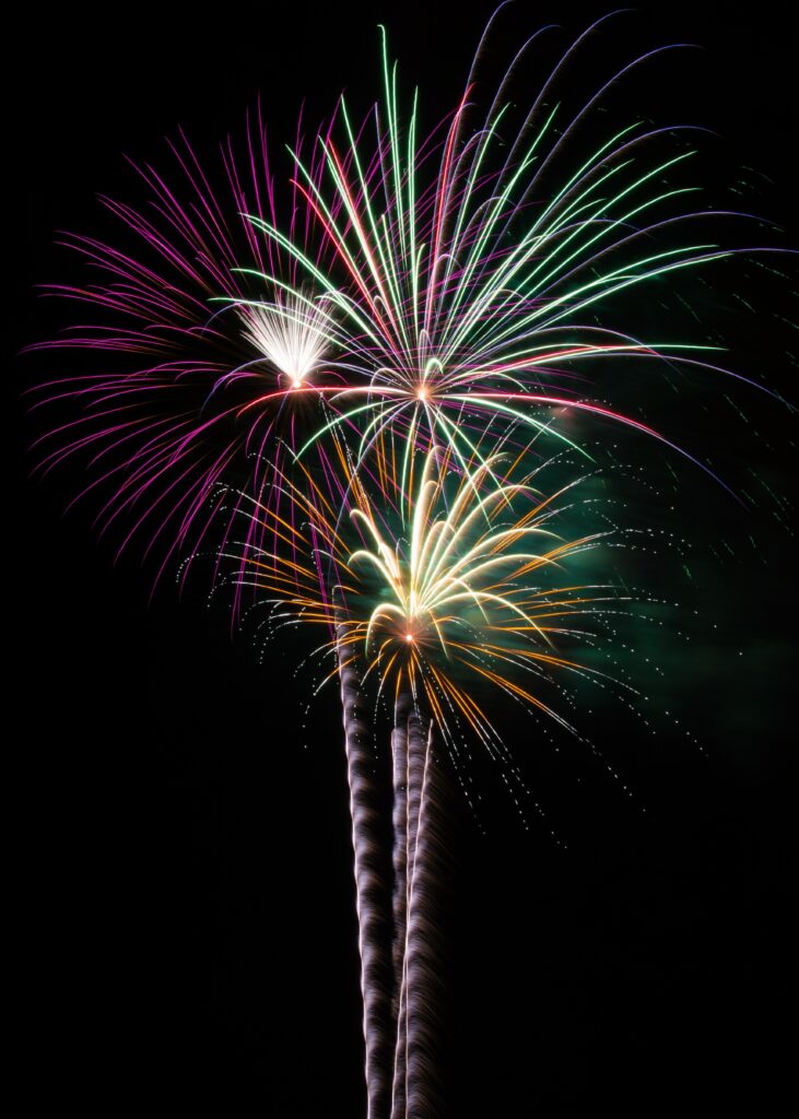 Vibrant Fireworks Wallpaper: Colorful Night Sky Background