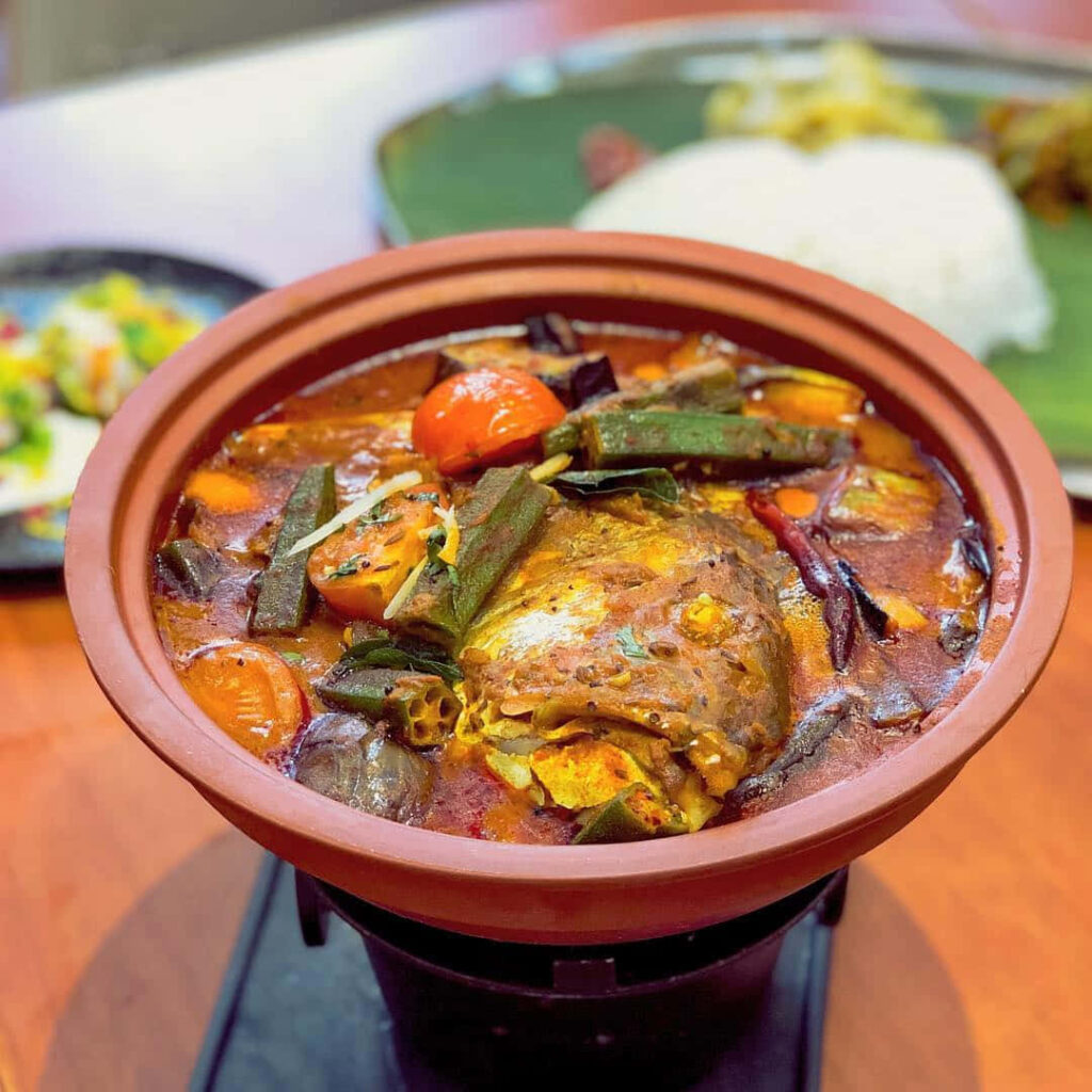 Vibrant Fish Head Curry Wallpaper with Fresh Vegetables