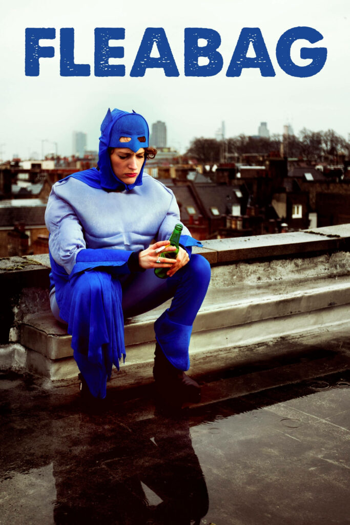 Colorful Fleabag Star in Unique Blue Costume - Urban Rooftop Wallpaper