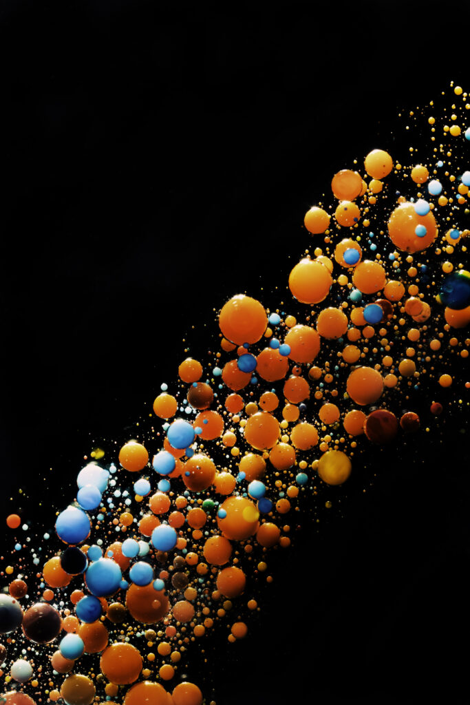 Vibrant Floating Bubbles Wallpaper on Dark Background - 3648x5472