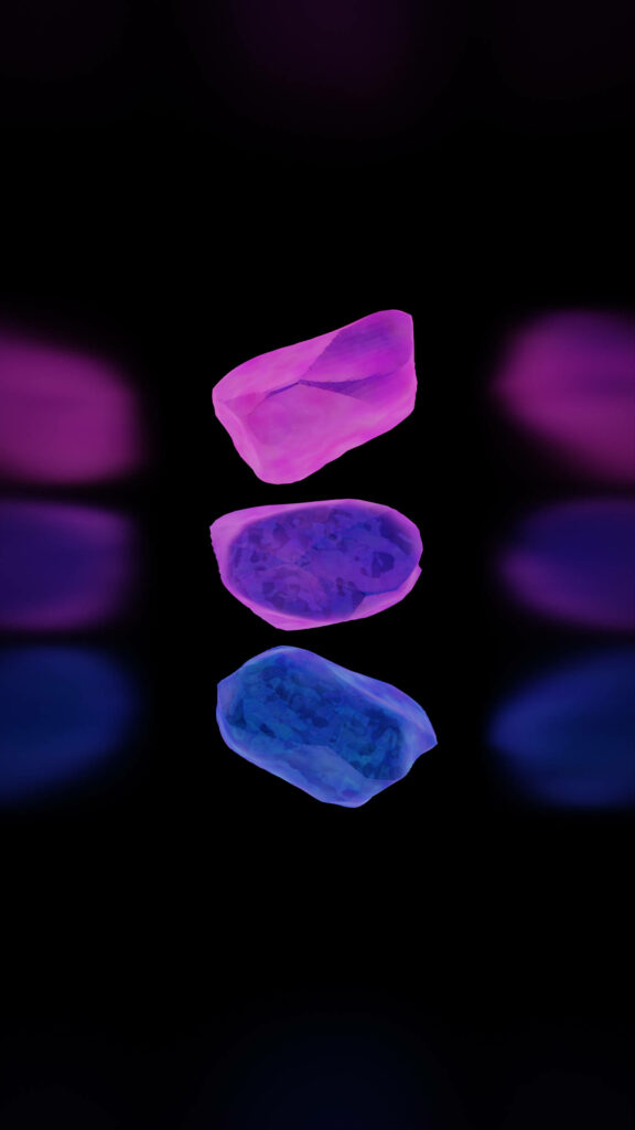 Vibrant wallpaper with three glowing pink purple blue crystals and reflections on black background