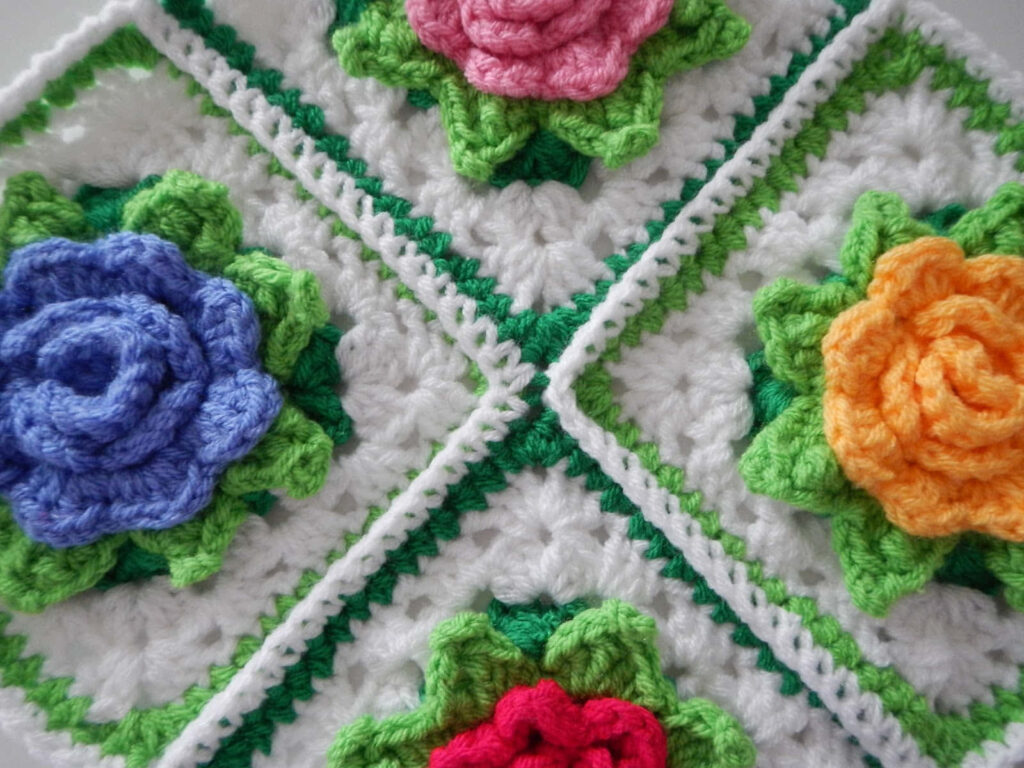 Vibrant Crochet Blanket Wallpaper with Colorful Floral Patterns