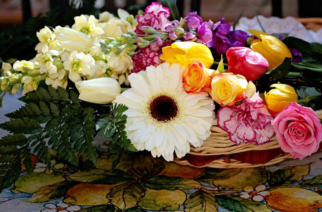Vibrant Floral Basket Wallpaper with Roses, Carnations & Tulips