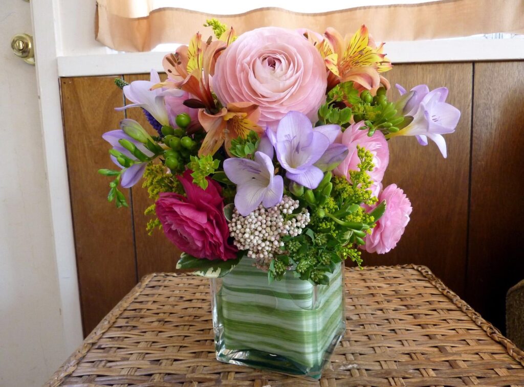 Colorful Floral Bouquet Wallpaper: Ranunculus & Freesia Design