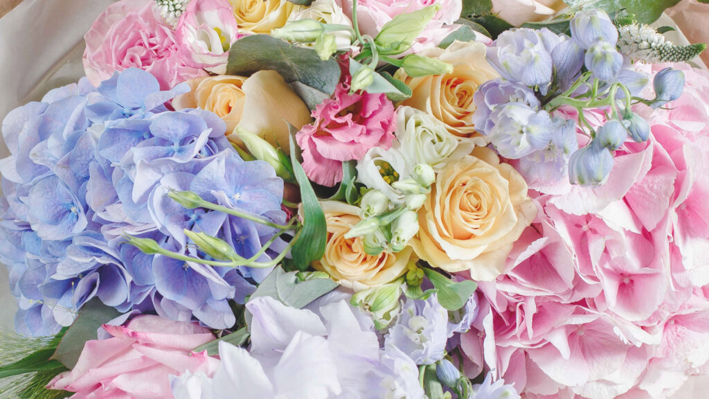 Vibrant Floral Wallpaper with Pink Hydrangeas and Creamy Roses