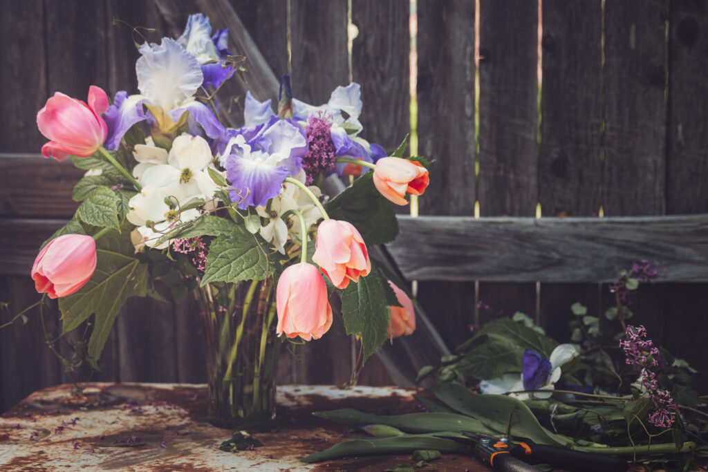Vibrant Flower Bouquet Wallpaper on Rustic Table | Serene Background