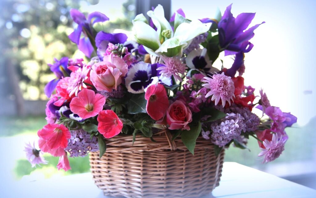 Vibrant Floral Wicker Basket Wallpaper: Roses, Petunias, Lilacs