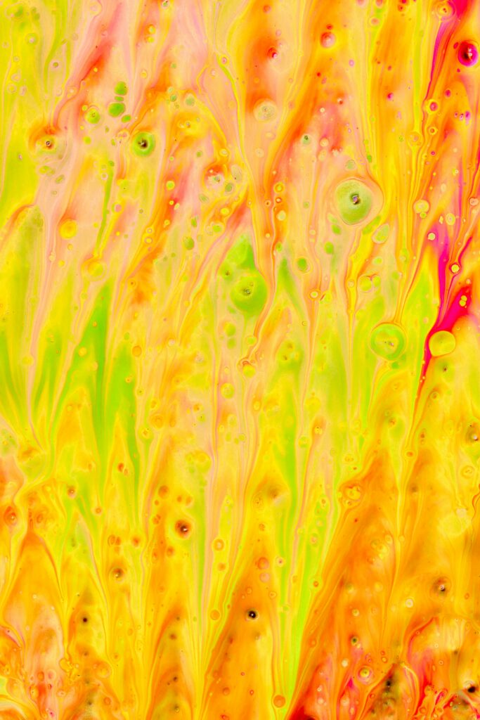Vibrant Fluid Art Wallpaper: Abstract Yellow Patterns & Hues