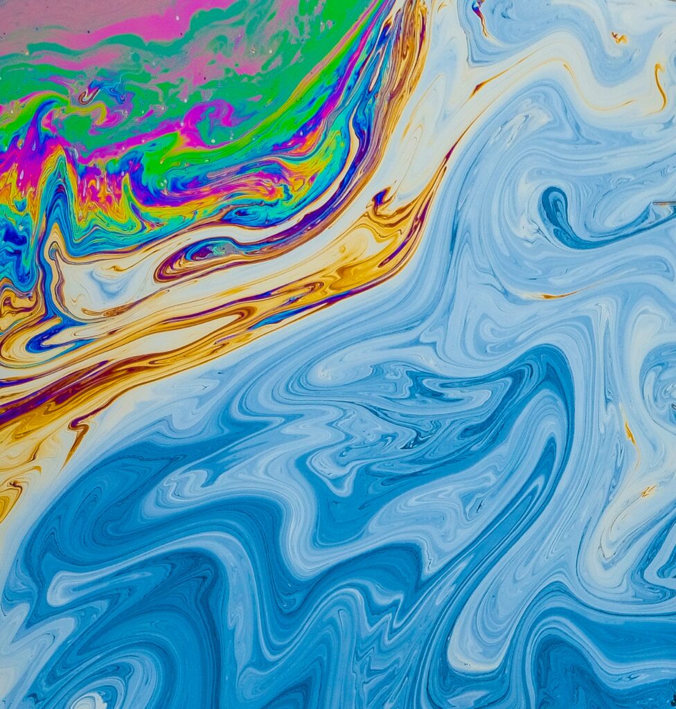 Mesmerizing Fluid Art Wallpaper: Vibrant Multi-Colored Blends