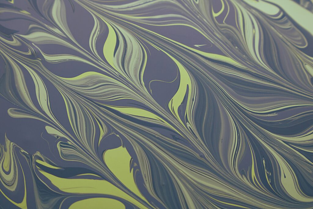 Vibrant Fluid Art Wallpaper: Abstract Green & Purple Design Background