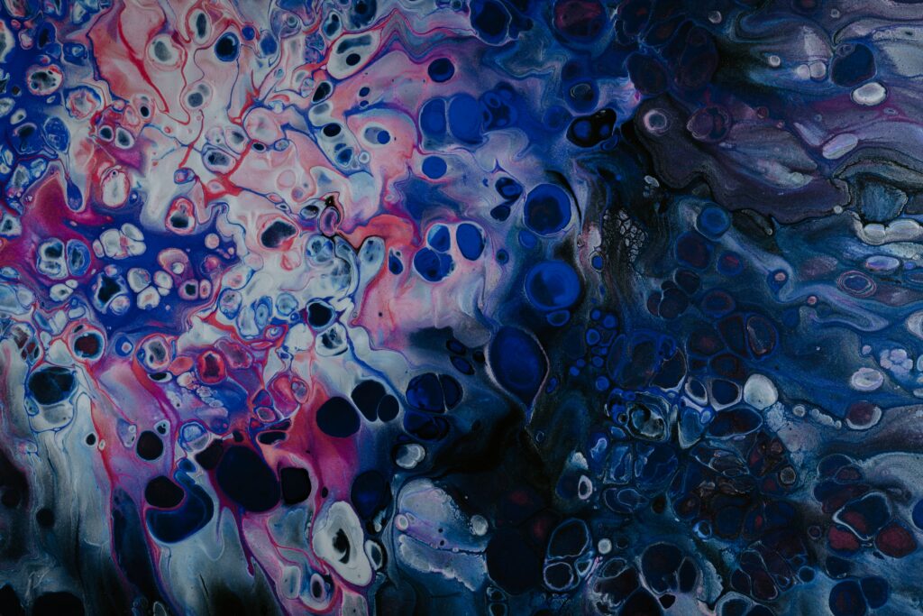 Vibrant Fluid Art Wallpaper: Swirling Blue, Pink & White Design