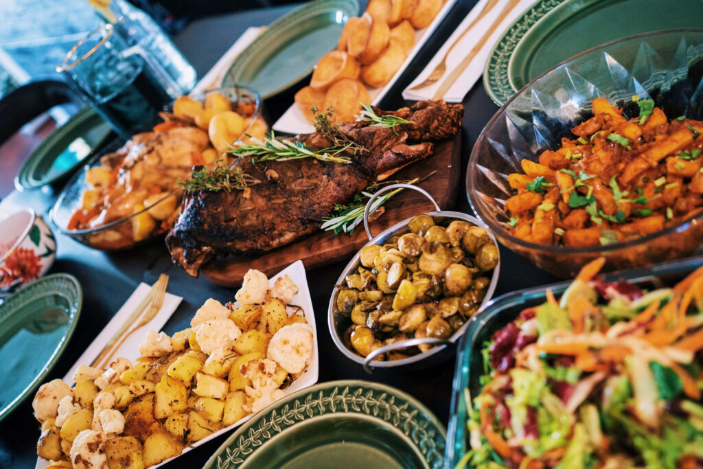 Vibrant Food Table Wallpaper: Grilled Steak, Sides & Salads Delight