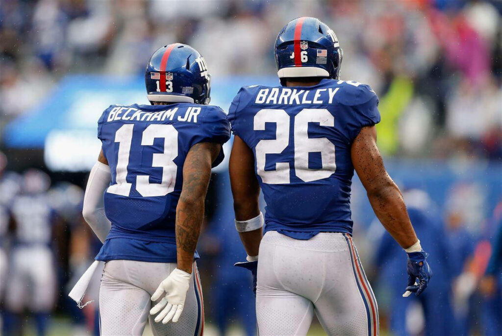 Dynamic Football Wallpaper: Saquon Barkley & Beckham Jr. Back Shot