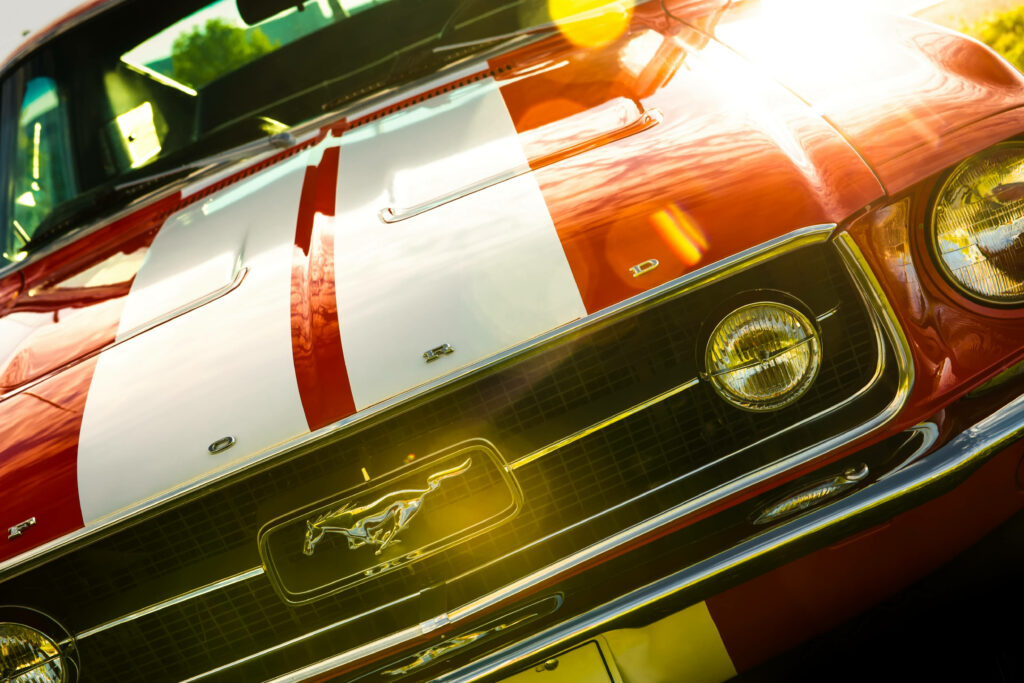 Vibrant Ford Mustang Wallpaper: Bold Red & White Racing Stripes