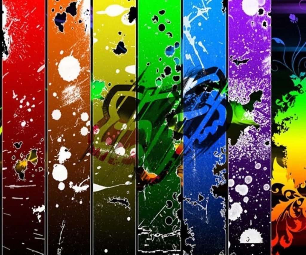 Fox Racing logo on vibrant vertical rainbow stripes with white paint splatters and floral accents Wallpaper