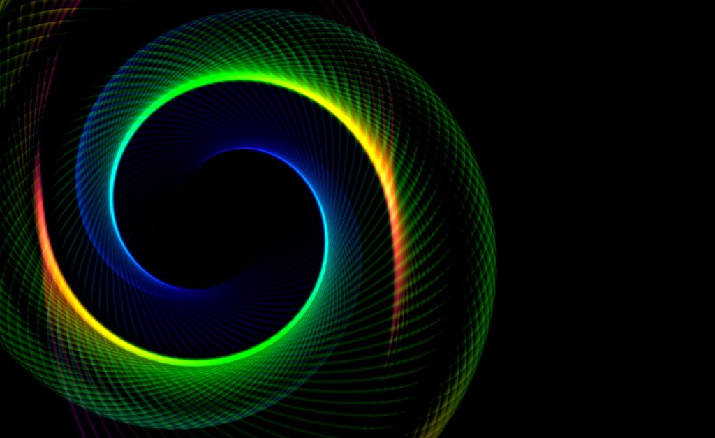Colorful Fractal Spiral Wallpaper: Endless Abstract Patterns on Black