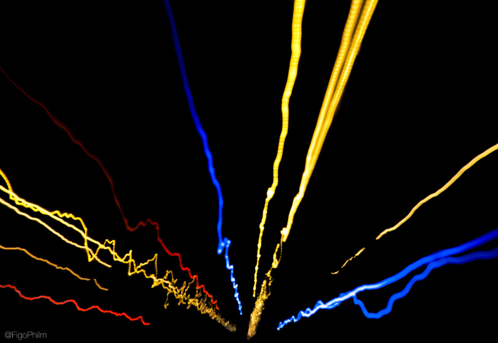Vibrant Streaks of Light Wallpaper: Dynamic Energy Lines on Black