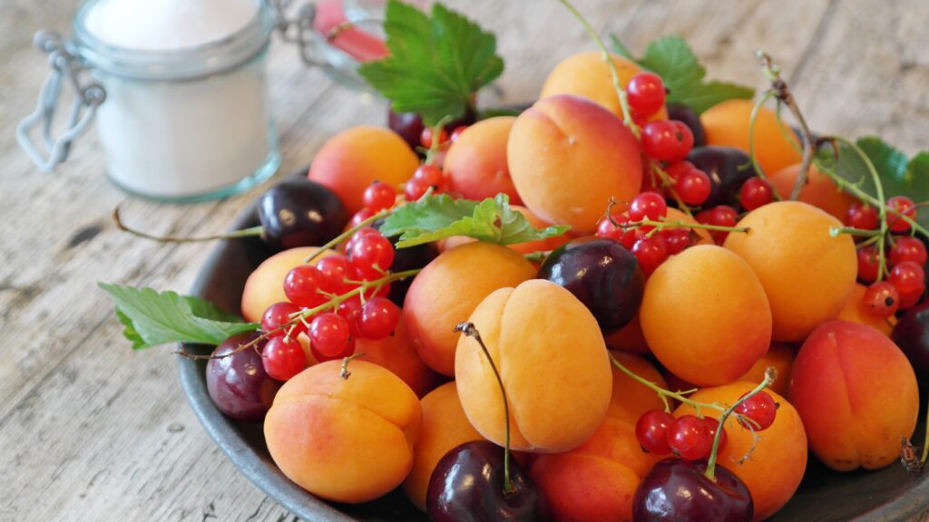 Vibrant Apricots, Cherries & Currants on Rustic Wood Wallpaper