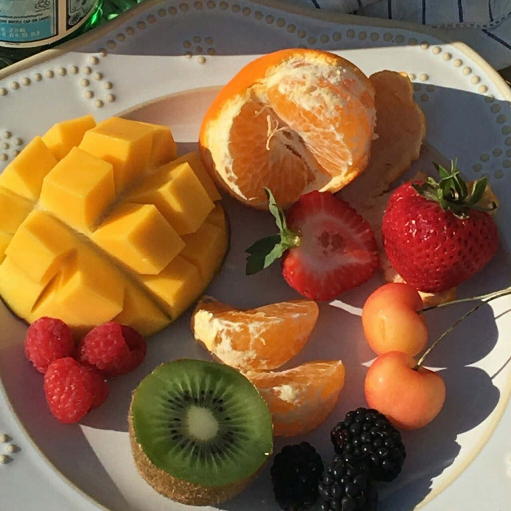 Colorful Fresh Fruit Arrangement on Decorative Plate - Wallpaper Background