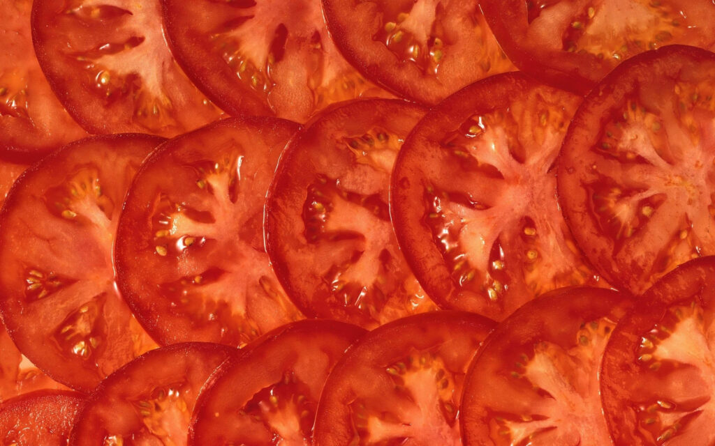 Vibrant Tomato Wallpaper: Juicy Red Hue & Detailed Texture Background