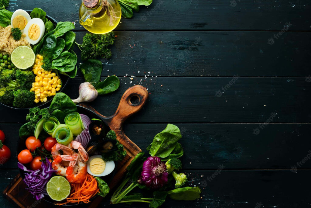 Vibrant Fresh Fruits & Vegetables Wallpaper on Rustic Wooden Table