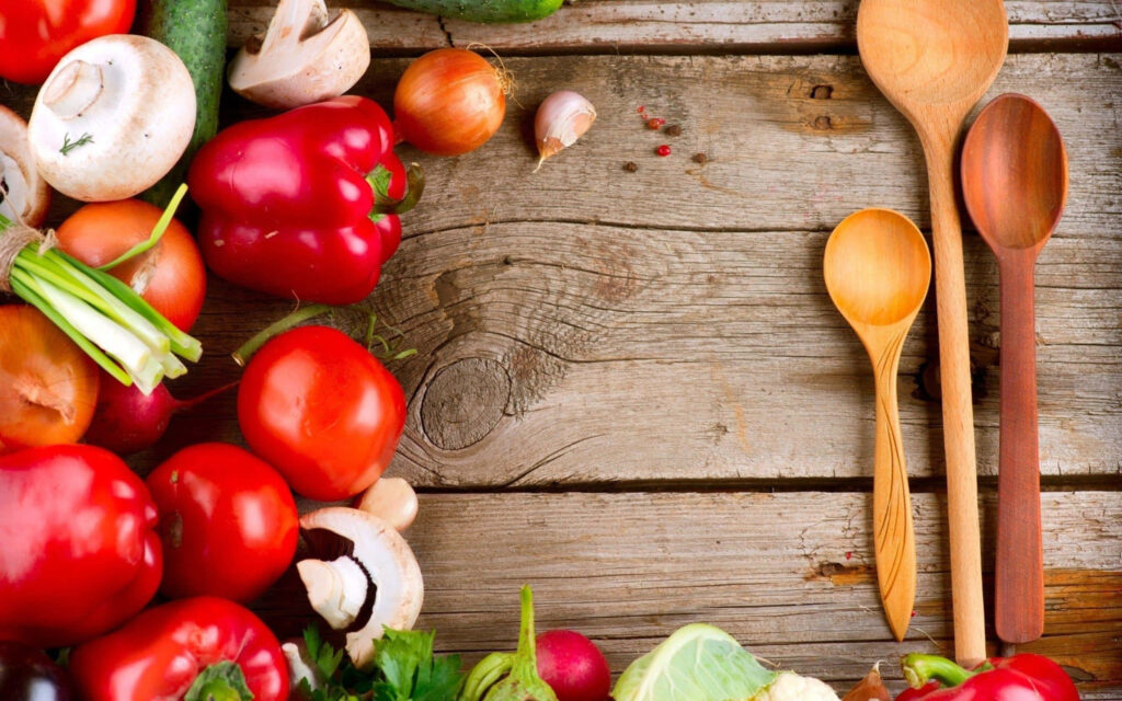 Vibrant Fresh Vegetables on Rustic Table: Healthy Cooking Wallpaper