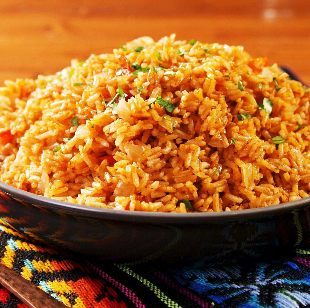 Vibrant Fried Rice Wallpaper with Fresh Herbs in Bowl on Table