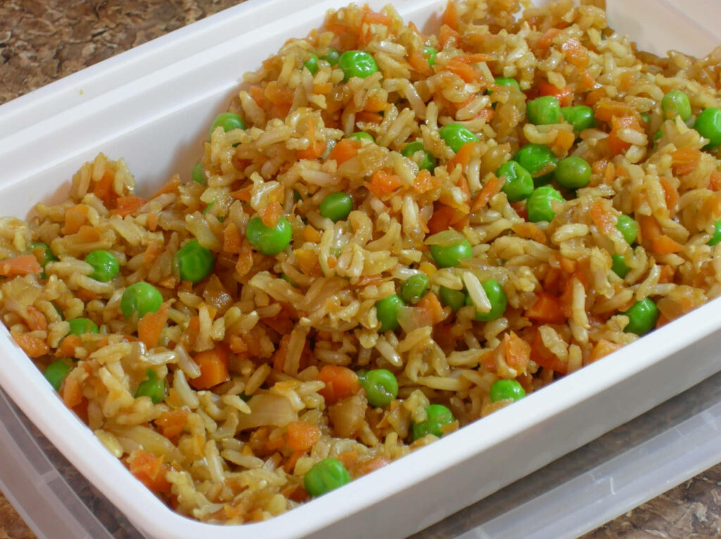 Vibrant Fried Rice with Peas & Carrots: Colorful Meal Wallpaper