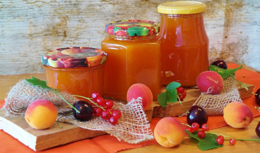 Vibrant Fruit Jam Wallpaper with Apricots, Cherries & Currants