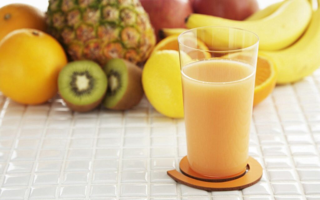 Vibrant Fruit Juice Wallpaper: Fresh Juice & Colorful Fruits