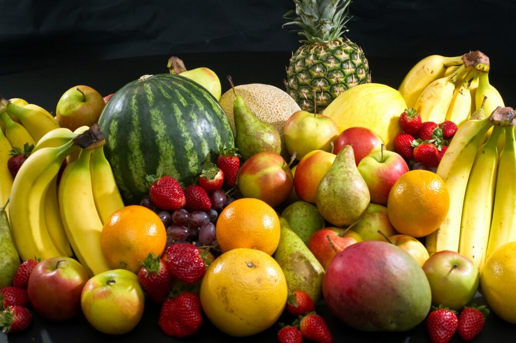 Vibrant Fruit Wallpaper: Pineapple, Watermelon & More on Dark Background