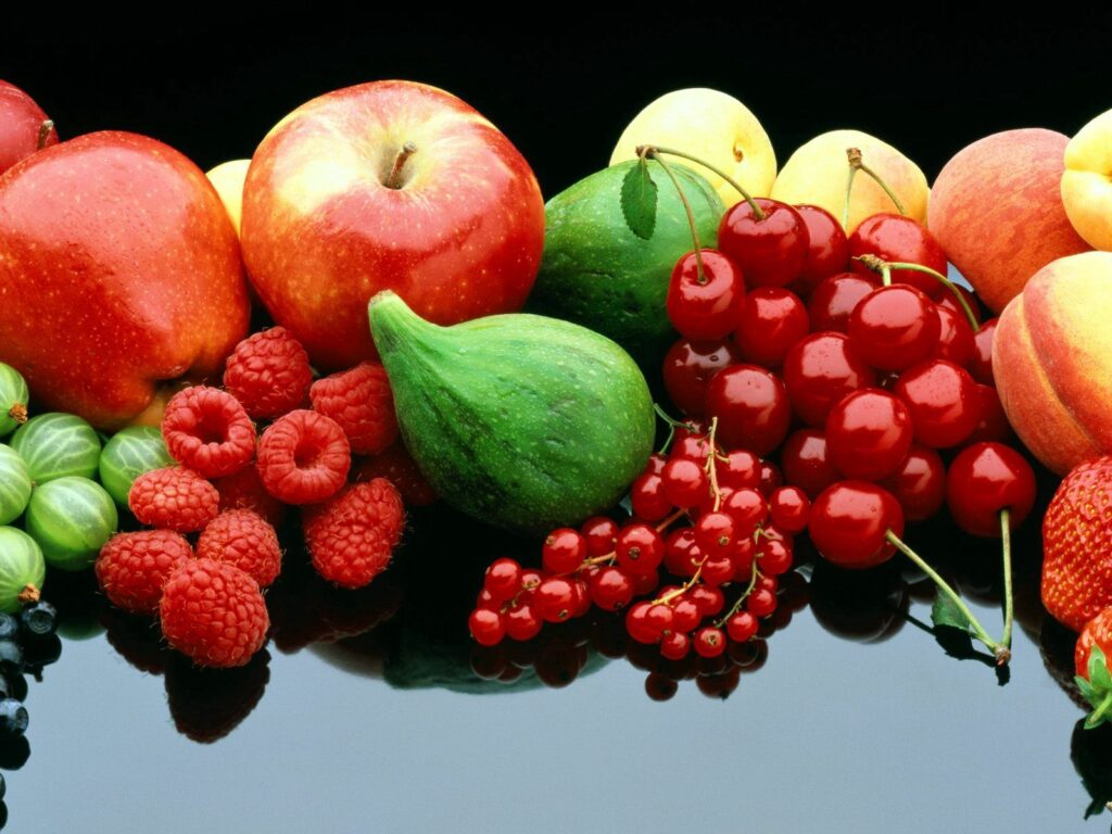 Vibrant Fruit Wallpaper: Colorful Assortment on Black Background