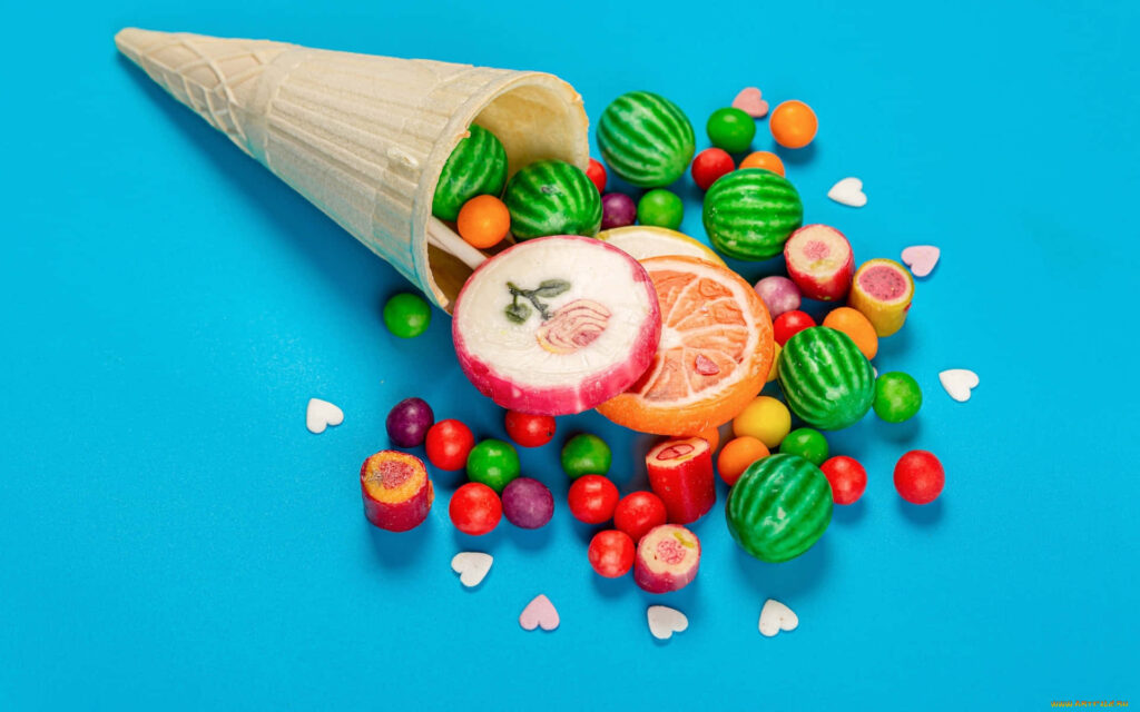 Vibrant Healthy Food Wallpaper: Fruits & Candies in an Ice Cream Cone