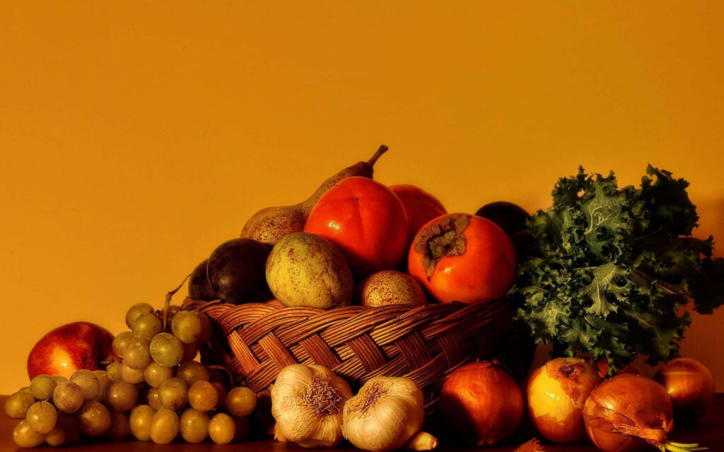 Cozy Rustic Wallpaper: Fresh Fruits & Vegetables on Golden Background