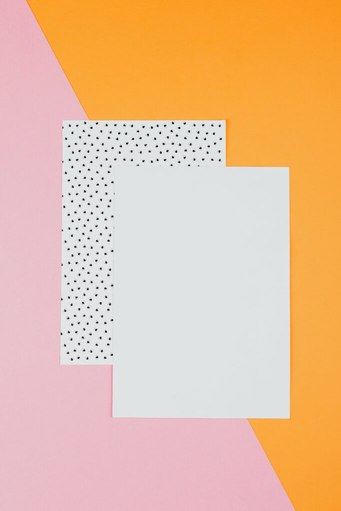“Vibrant Textiles: A Fusion of Orange and Pink in HD Phone Wallpaper”
