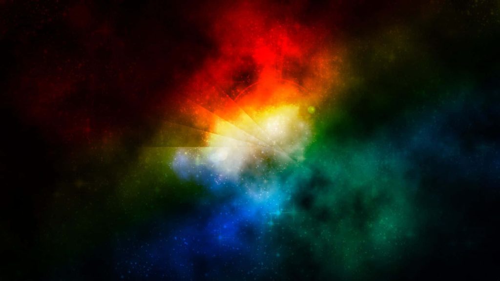Vibrant galaxy nebula digital art wallpaper with glowing rainbow light and starry cosmic background