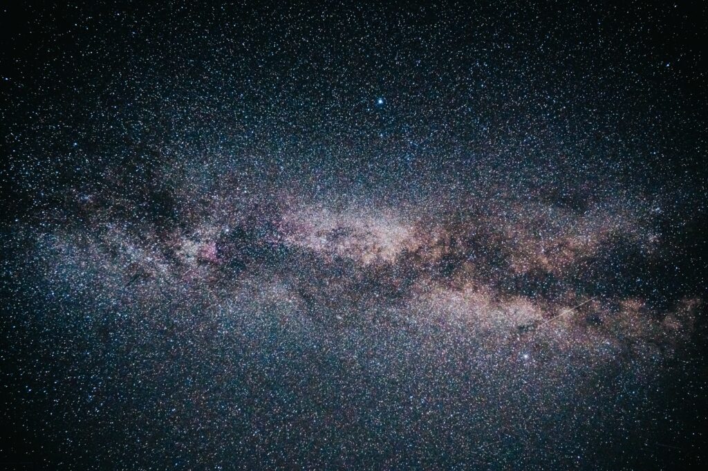 Vibrant Space Wallpaper: Colorful Galaxy & Glowing Nebula Background