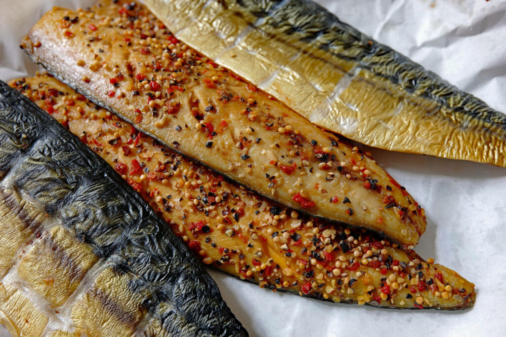 Juicy Garlic Mackerel Fillets with Spices - Vibrant Wallpaper Background