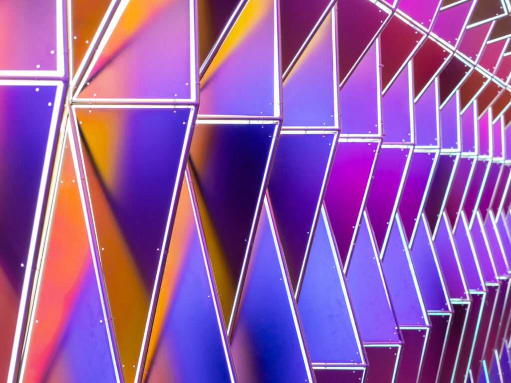 Vibrant Geometric Triangle Wallpaper: Colorful Dynamic Background
