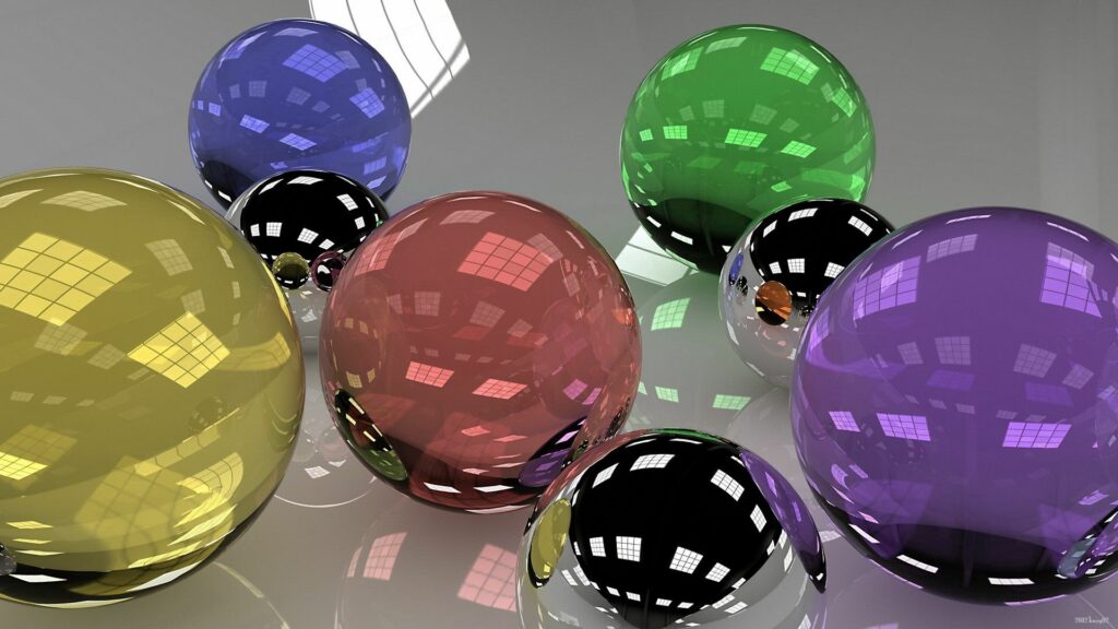 Vibrant Colorful Glass Balls Wallpaper with Reflective Patterns