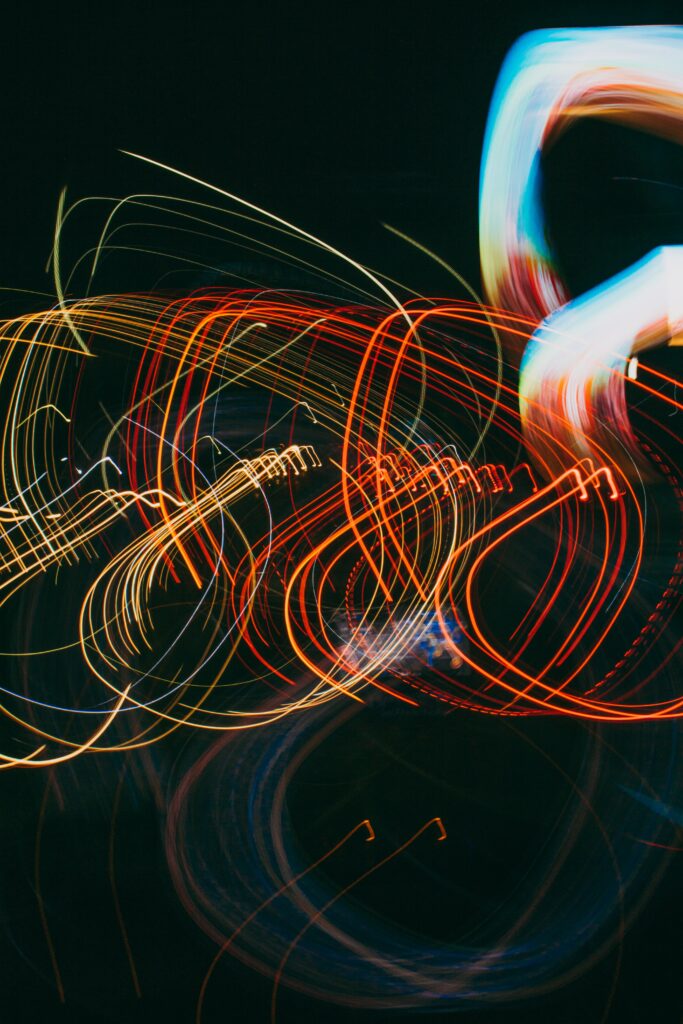 Vibrant Abstract Light Trails: Dynamic Freezelight Wallpaper
