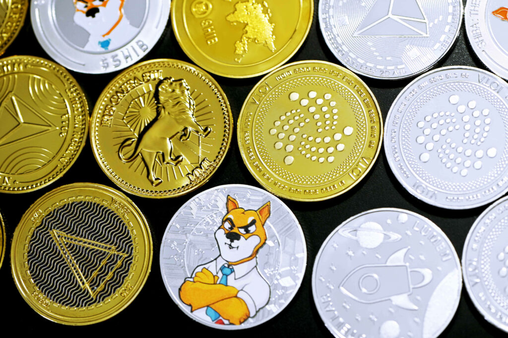 Vibrant gold and silver digital currency coins collage cryptocurrency wallpaper background